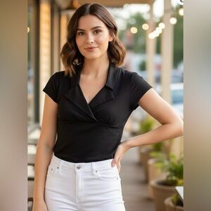 Wrapper black extended shoulder blouse, soft polyester, size medium.